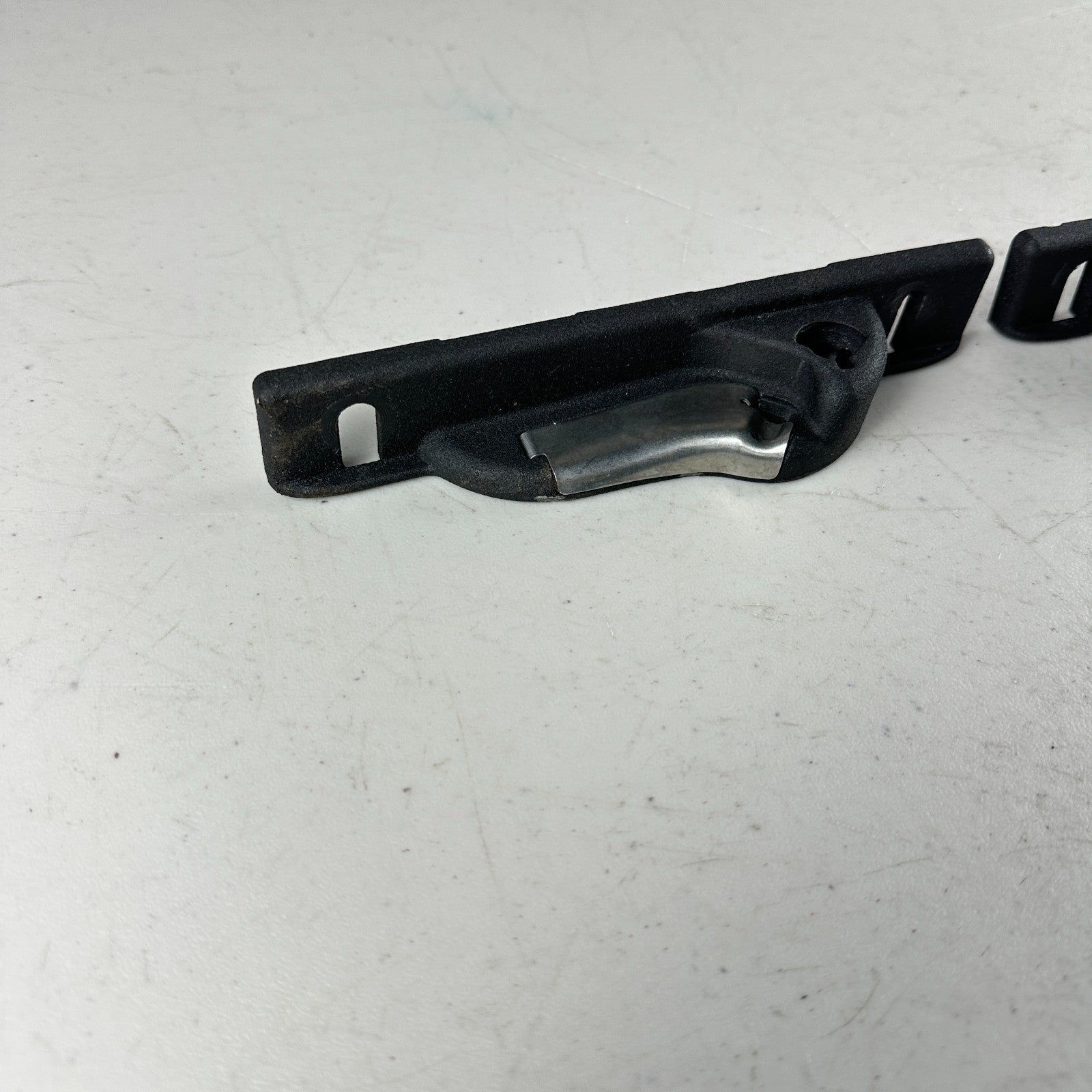 05-13 CHEVROLET CORVETTE FRONT LEFT & RIGHT TOP RAIL FOLDING LATCH STRIKERS OEM
