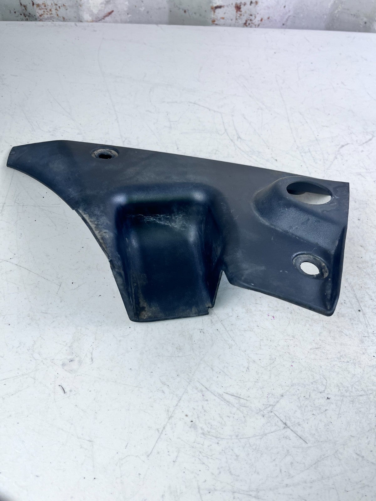 2010-2015 CHEVROLET CAMARO REAR LEFT SIDE BUMPER CLOSE OUT FILLER FLAP TRIM OEM